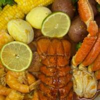 Seafood Delight半磅蟹半磅虾1只龙虾(半磅香肠10芥蓝2蛋2玉米4土豆) · 1 Pc LobsterTail+1/2LB Sonw  Crab Leg+1/2LB
Shrimp No Head+1/2Lb Sausage+10 Pc Broccoli+2 Eg...