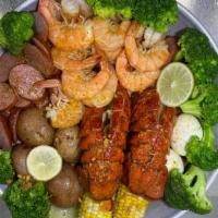 Double Lobster  2只龙虾1磅虾半磅香肠2蛋10芥兰2玉米4土豆 · 2 pc Lobster Tail 1 LB shrimp(no Heads) 1/2LB Sausage 10 pc Broccoli 2 Egg, 2 Corn, 4 Potato