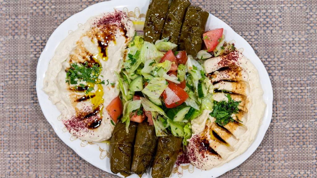 Grape Leaves · 6 piece. Stuffed with rice, tomatoes, onion, and olive oil