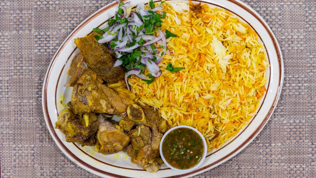 Mendi Lamb & Rice · Our most popular dish, tender lamb seasoned and slow-roasted to perfection. Served on top of our chefs specialty mendi rice.