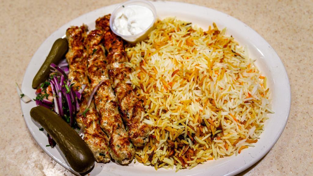 Chicken Kufta Kabab · 3 skewers of Rayan special recipe of ground chicken breast mixed with parsley, garlic, and an array of spices, grilled onions, and tomatoes served with rice.
