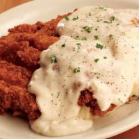Country Fried Chicken · 10 oz. chicken breast covered in our special breading and deep-fried. Served with our homema...