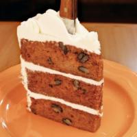 Texas Carrot Cake · Layers of cream cheese frosting in a moist carrot cake that is the size of Texas.