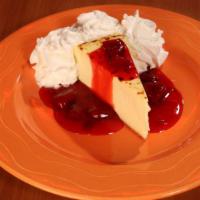 Strawberry Cheesecake · The classic NY Cheesecake served with strawberries on the side and whipped cream.