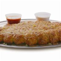 Half Order Cheesy Breadsticks · Four breadsticks, fresh-baked with garlic butter and smothered in our pizza cheese. Served w...