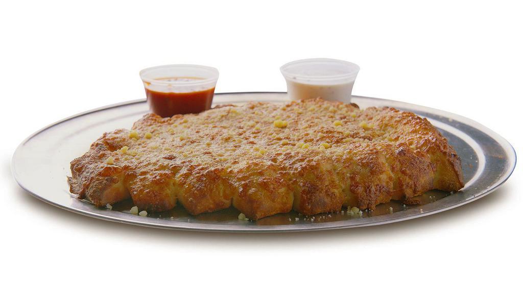 Half Order Cheesy Breadsticks · Four breadsticks, fresh-baked with garlic butter and smothered in our pizza cheese. Served with homemade ranch, blue cheese dressing or marinara.