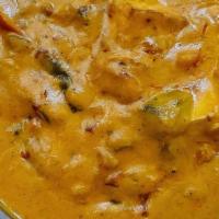 Paneer Tikka Masala · Paneer cubes cooked in chef’s special bell pepper-based masala sauce. Served with a portion ...