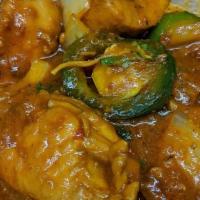 Chicken Kadhai · Chicken cooked with onions, bell peppers with spices in tomato onion sauce.