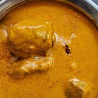Lamb Pasanda · Tender lamb pieces cooked in a rich creamy sauce with mild spices. Served with side basmati ...