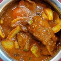 Lamb Kadhai · Lamb cooked with bell peppers, onion in tomato and onion sauce.