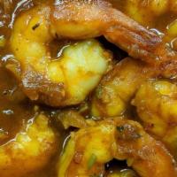 Shrimp Curry · Shrimp cooked in curry sauce. Served with side basmati rice.