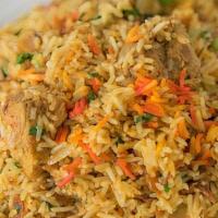 Chicken Biryani · Basmati rice is flavored with chicken and cooked in the chef’s special biryani masala. Serve...