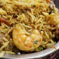 Himalayan Biryani · Basmati rice is flavored with Mixed chicken, lamb, shrimp and cooked in the chef’s special b...