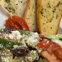 Mediterranean Greek Salad · Spring greens, tomato, cucumber, green peppers, feta cheese, kalamata olives, onions, oregan...