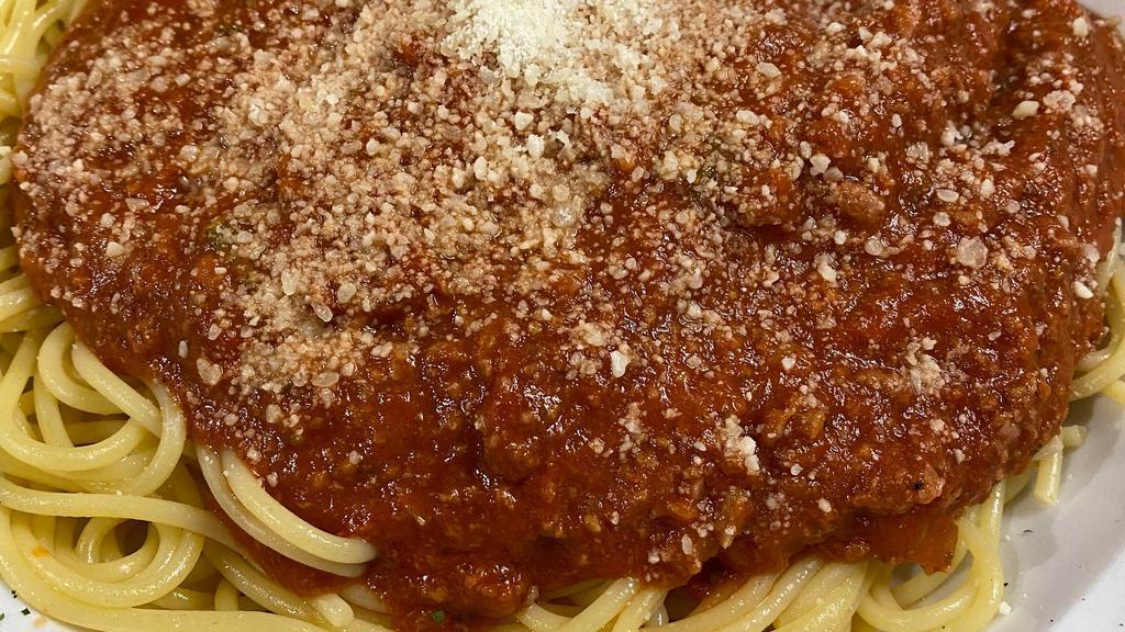 Spaghetti With Meat Sauce · Spaghetti topped with our homemade meat sauce.