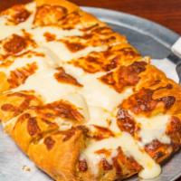 Giorgio'S Cheese Bread · Our fresh homemade pizza dough, stuffed and topped with mozzarella cheese and baked to perfe...