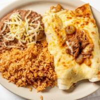 Wet Burrito · Rolled flour tortilla filled with your choice of ground meat or chicken, beans, lettuce, and...