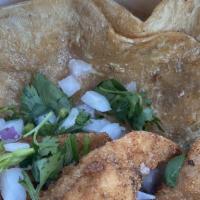 Fish Tacos · Breaded or grilled fish with lettuce, sour cream, cheese, cilantro and onions with rice and ...
