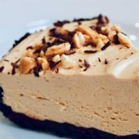 Slice Of Peanut Butter · chocolate wafer crust, chocolate ganache, peanut butter mousse, salted peanuts, shaved choco...