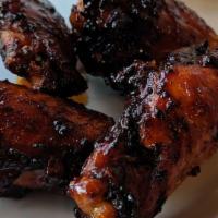 Chicken Wings · Slow-smoked and flash fried to a crisp. Wings are split drums and flats. Available naked or ...
