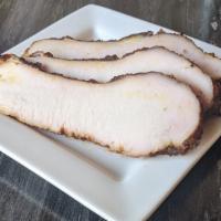 Smoked Turkey · Turkey breast dry rubbed and smoked 3-4 hours until tender and juicy