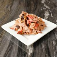 Pulled Pork · Juicy, smoky, and tangy pulled pork shouder. Smoked 16 hours and pulled to order