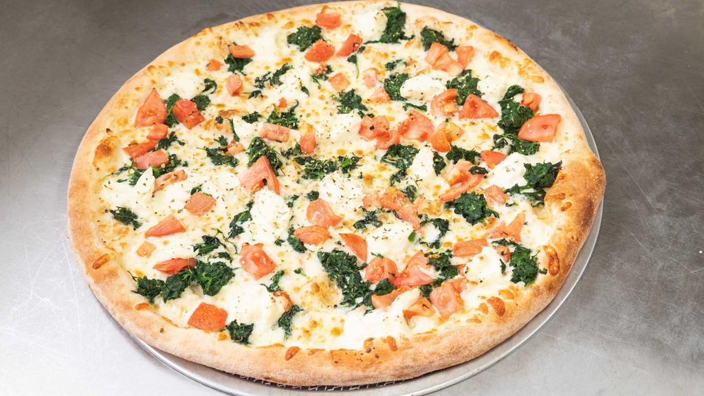 Spinach & Ricotta Pizza · No sauce, premium mozzarella cheese, spinach, tomato, ricotta cheese and fresh garlic.
