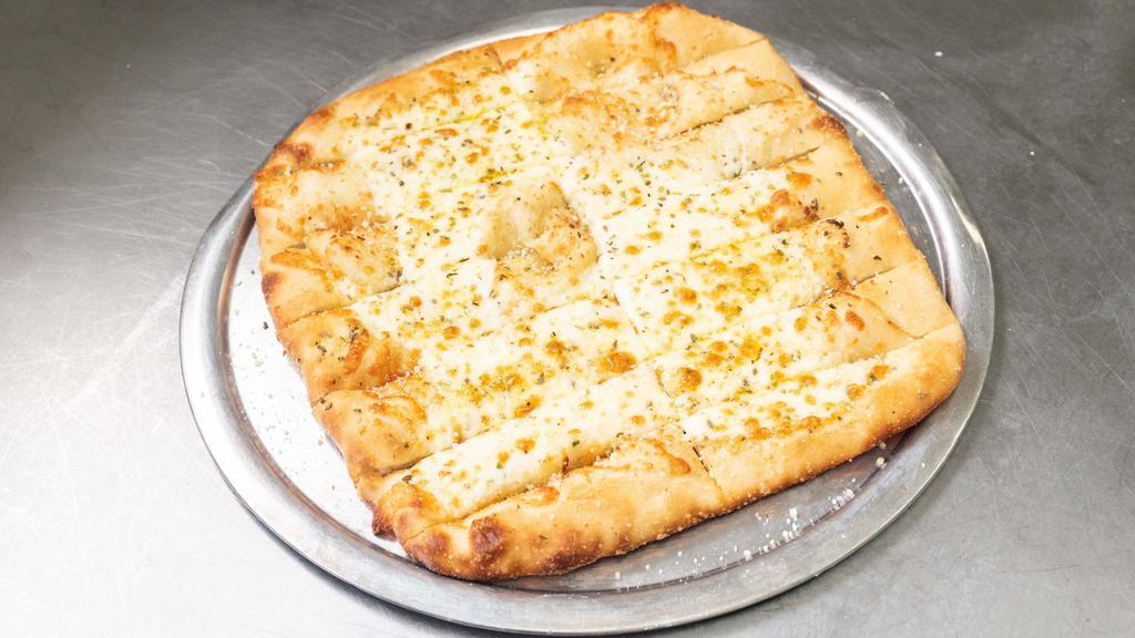 Royal Cheese Bread · Freshly baked pizza dough with premium mozzarella, topped with butter, garlic and parmesan.