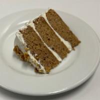 Carrot Cake · 3 layer carrot cake made with pineapple and walnuts.
