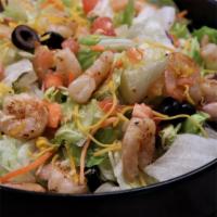 Shrimp Salad · Shrimp, lettuce, guacamole, sour cream, tomatoes, cheese, and carrots.