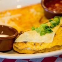 Gringo Omelette · Chorizo sausage, pepperjack cheese, hash browns, sweet peppers and onion, topped with green ...