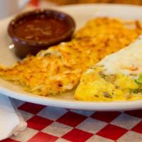 Italian Omelette · Italian sausage, sweet peppers and onion, topped with mozzarella cheese and marinara sauce