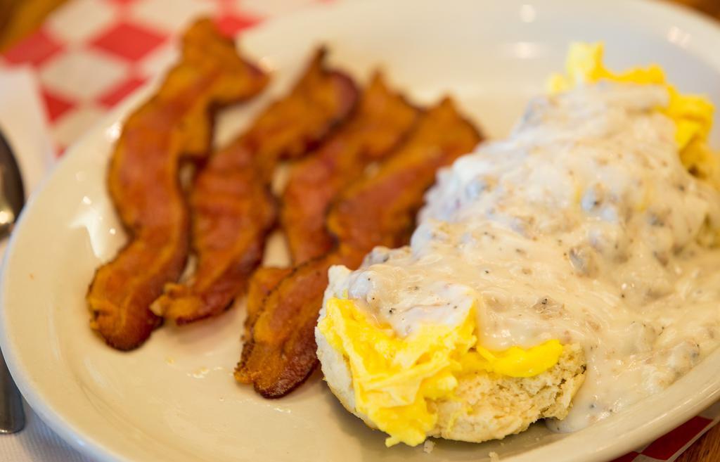 Biscuit Topper · Open faced biscuit topped with an egg and sausage gravy with a side of bacon, sausage links or patties.