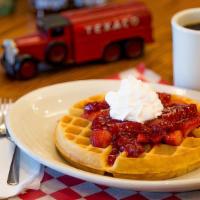 Waffles · Our Belgian waffle served with maple syrup and whipped butter