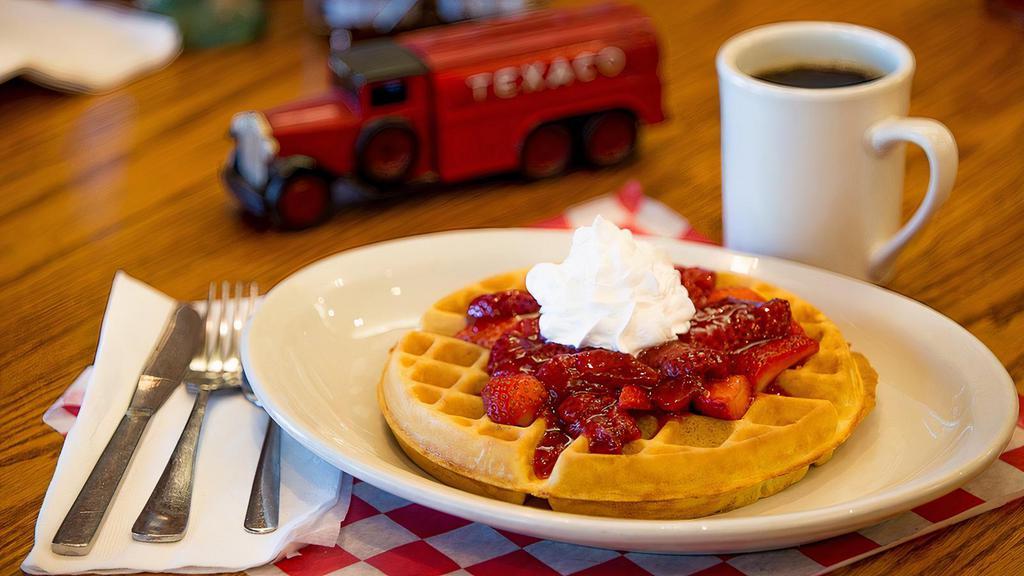 Waffles · Our Belgian waffle served with maple syrup and whipped butter