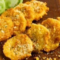 Fried Green Tomatoes · Vegetarian. Hand-breaded, fried golden brown, Parmesan, parsely, chipotle ranch.