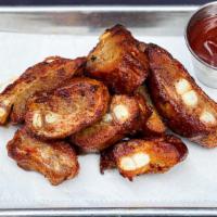 Rib Tips App · An appetizer portion of our smoked rib tips, served with a side of your choice of sauce