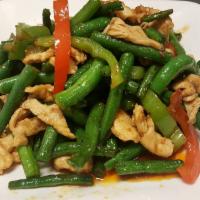 Pad Prik Khing / Spicy Ginger · Stir-fried meat with curry paste, fresh green beans, white onions, julienne bell peppers and...