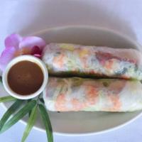 Spring Rolls (2) · Fresh rolls of rice noodles, shrimp, pork, cilantro, mint, and carrot, served with peanut sa...