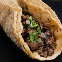 Steak Taco · Cilantro, onion, lime