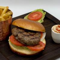 Mediterranean Burger* · Middle Eastern beef patty blended with parsley and onion, lettuce, tomato, hummus. Served on...