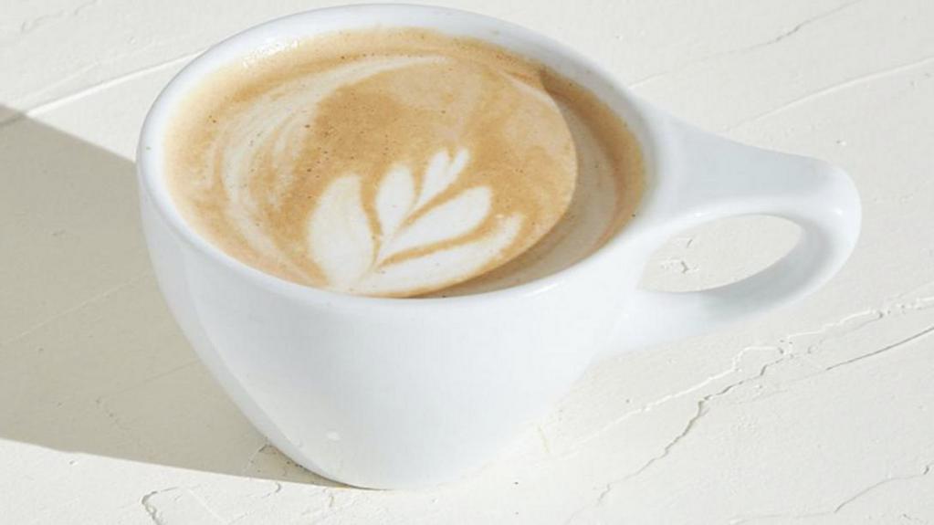 Cappuccino · Double shot of espresso with 4 oz of steamed or iced milk. Select Whole Milk, Almond Milk, or Oat Milk.
