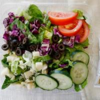 Garden Salad · Iceberg and romaine lettuce mix with red cabbage, cucumber, tomatoes, green peppers, mushroo...