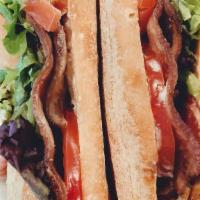 Blt  · Bacon, lettuce, tomato and mayo on fresh baked baguette.