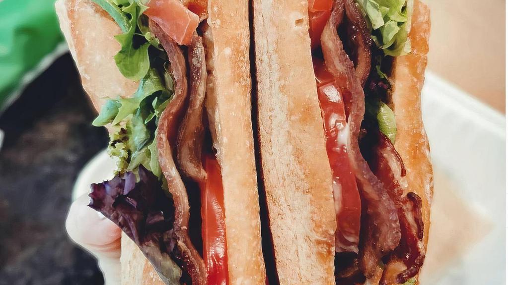 Blt  · Bacon, lettuce, tomato and mayo on fresh baked baguette.