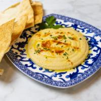 Hummus · Vegetarian. Vegan. Organic. Gluten-Free. Our special recipe Hummus. Served with Pita.