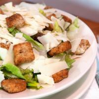 Caesar Salad · Romaine lettuce served with parmesan cheese, croutons and Caesar dressing.