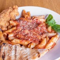 Kids Idk What I Want · Mostaccioli topped with a chicken tender, served with bread and butter.