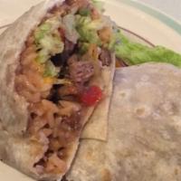 Burrito Patron · A large flour tortilla filled with seasoned ground beef or chicken. Topped with lettuce, che...