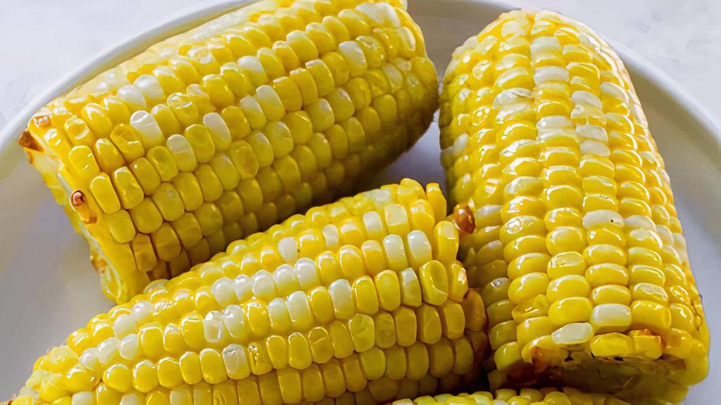 Corn On The Cob · delicious sweet corn on the cob with butter.